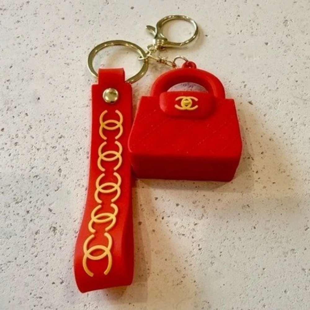 NEW FASHION BAG CHARMS KEY CHAINS. NWOT RED ORANGE /‎ GOLD